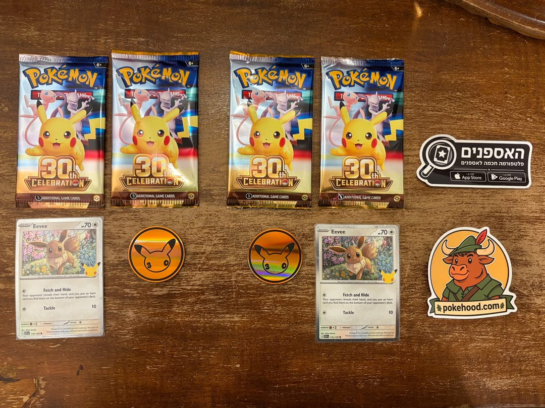 תכולת Knock Out Collection: ארבע חבילות, שני Eevee ושני מטבעות